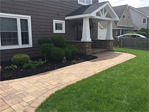 cambridge sahara chesnut ledgestone walkway random pattern cultured stone columns hamptons style